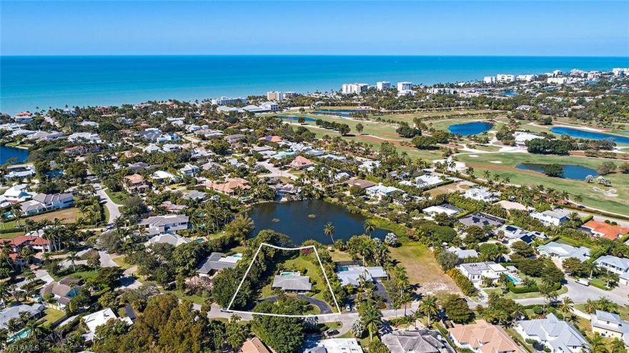 Rare offering of a large, lakefront property previously held by the same family for decades.  Almost half-acre tree-lined property on bucolic and quiet Bougainvillea Road in Old Naples.  Perfect northwest exposure with 75 feet on the water.  Just steps from the new Four Seasons resort and three and a half blocks to the white sands of the Gulf of Mexico, and a short hop to all that Old Naples has to offer on Fifth Avenue and 3rd Street South.