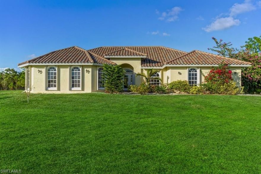 Beautiful Golden Gate Estates 4 bedroom, 3 bath, pool home on 2.5 acres. This spacious home offers 10-12ft coffered ceilings, crown trim and 8 foot doors; open floor plan with tile throughout living area and bathrooms.   Granite countertops throughout, stainless steal appliances, walk-in pantry, formal dinning room, breakfast nook, and eat-in bar kitchen. The Master Suite offers large walk in closet, dual sinks, large tub, shower, water closet with bidet, sliding glass doors that open up to extended lanai area over looking pool. Exterior features, HVAC approximately 7 years old, water system 2020, property fenced with gate, tile roof 2018, new well 2018, hurricane shutters, large paved driveway and fruit trees.