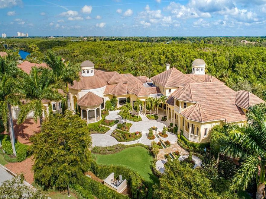 H.14009 - Previously staged but now being offered fully furnished with beautiful, brand new furnishings, INCLUDED in the price! Come and live the Bonita Bay dream lifestyle! Seller will consider a trade, perhaps some creative financing on this 14,363 sq.ft. A/C home! Ground floor master suite is gorgeous, and every room has a beautiful garden view! Truly a grand estate with seven bedroom suites, a theater room, game room, billiards room and more.  Bonita Bay's show-stopper! The lavish pool and sunning patios are ideal for entertaining or enjoying privately, amidst the immaculate, palatial grounds, mature trees, meticulously groomed gardens and lovely water features. Situated on a double lakefront lot, 1.3 acres in Bay Woods, the exquisite craftsmanship, and stellar finishes are sure to excite and delight even the most discriminating of buyers. This property exudes European charm from the minute you pull up to the motor court. For the car enthusiast, there is a five car collector's garage. Bonita Bay is one of SW Florida's premiere golf communities with an active Country Club lifestyle,  private beach club and marina, 54 holes of championship golf and state of the art amenities.