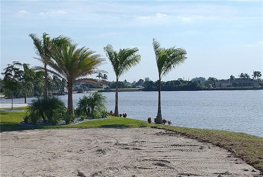 Oversized lot, cleared, with 132 foot on the water with new seawall, unobstructed views of Meadowview Lake and also a view of Crystal Lake. Direct Gulf access canal with no bridges. Lot is located one block from Crystal Lake park going in with its beach, play areas, scuba, walking and exercise trails. You are close to golf, marinas, waterfront dining, art galleries, shopping, and so much more. From your door, you can enjoy many Florida outdoor activities, such as fishing, kayaking, boating, swimming, biking, hiking, golf or you may just relax by the pool watching the sunsets, manatees and dolphins. This is a newly developing area with many luxury waterfront homes going in. Agent has an interest in the property.