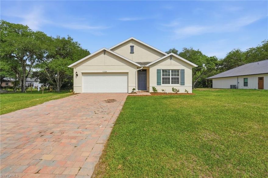 Welcome to this beautifully maintained newer construction home located in Glades County! Offering 4 bedrooms, 2 bathrooms, and an open-concept layout, this home features a bright and airy living space perfect for both everyday living and entertaining. The modern kitchen showcases white cabinetry, stainless steel appliances, and a large island with seating.

Situated on an almost half-acre lot, the property offers plenty of outdoor space, highlighted by beautiful nature oak trees that provide shade and character. There’s ample room for a pool, outdoor living area, or additional storage.

Enjoy the peaceful setting while still being just a short drive from town, with convenient access to nearby cities like Fort Myers and Miami.

Located in Glades County, this property is zoned for West Glades School, a highly sought-after option in the area.

Don’t miss this opportunity to own a spacious property with modern features and room to grow!