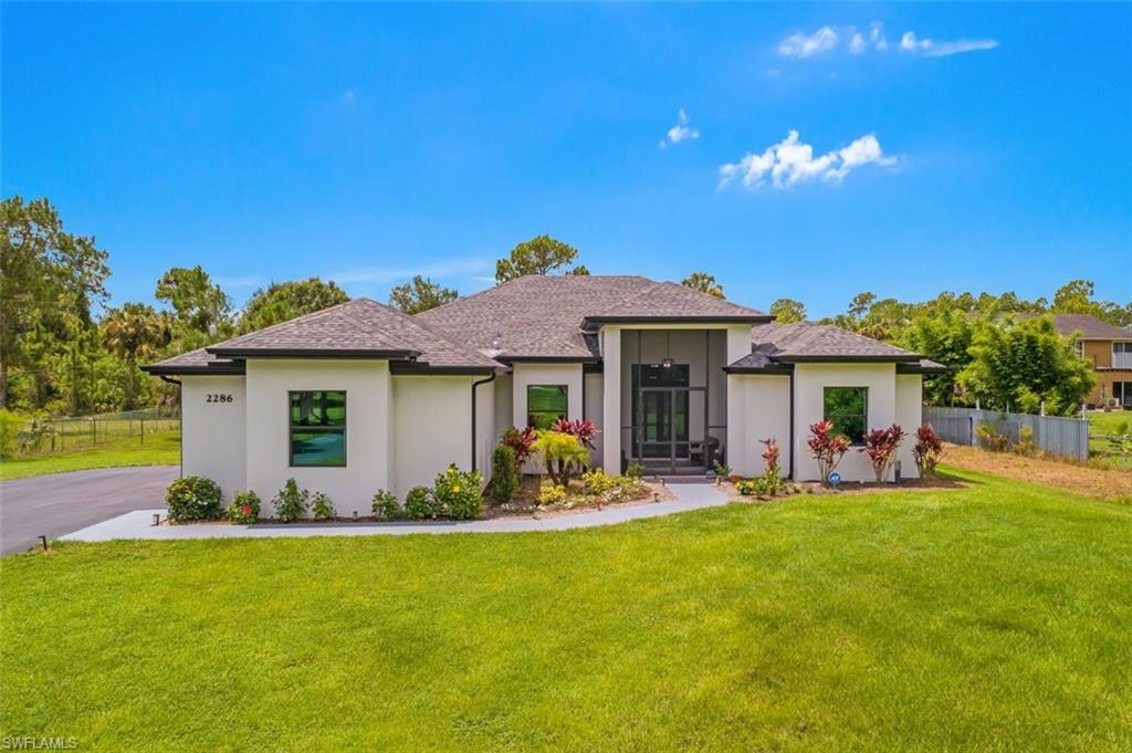 Photo of 2286 2nd AVE SE, NAPLES, FL 34117 (MLS # 226027503)