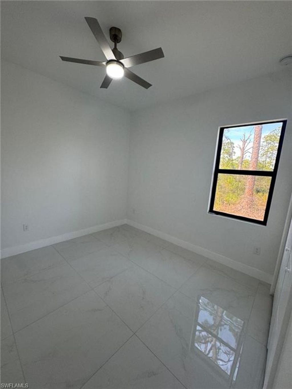 Photo of 920 Palmetto AVE, LEHIGH ACRES, FL 33972 (MLS # 226003358)