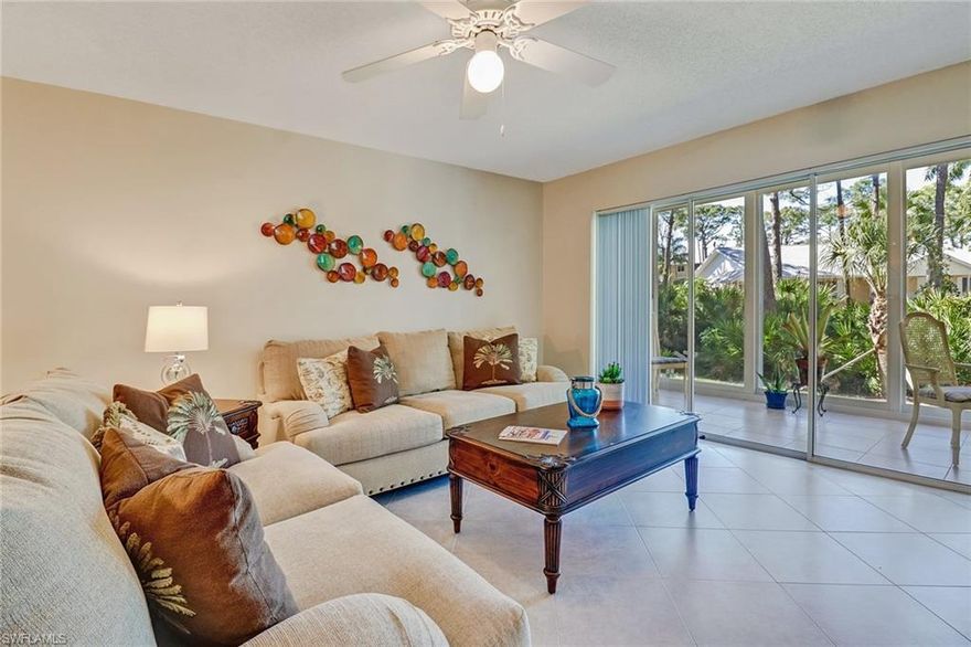 Light, bright and oh so beautiful, this charming 2 bedroom, 2 bath corner unit has it all!  Partially furnished and featuring impact glass on all windows and exterior lanai shutters, an upgraded kitchen with abundant cabinet and counter space, upgraded baths, ceramic tiled entry, kitchen, living, dining and glass-enclosed lanai/sunroom overlooking a tropical preserve, and extra windows in each bdrm.  Mstr Bdrm features a King bed and en-suite w/ walk-in shower and a separate vanity area featuring upgraded cabinets and a large walk-in closet.  Gst Bdrm offers Twin beds and side by side closet and shares a common bath featuring tub/shower combo and upgraded cabinets.  Large laundry room with cabinets and enough space for tons of storage!  This adorable condo is just steps from the community clubhouse.  1 assigned parking space is attached.  NSBC features boat docks for lease or purchase, new roofs, 2 heated community pools, grill and picnic stations, beautiful landscaping, new community lighting, exterior paint, and blacktop.  Walkable to Tin City and 5th Ave or Bayshore and Celebration Park, whatever your preference, this condo has everything you're looking for and more!