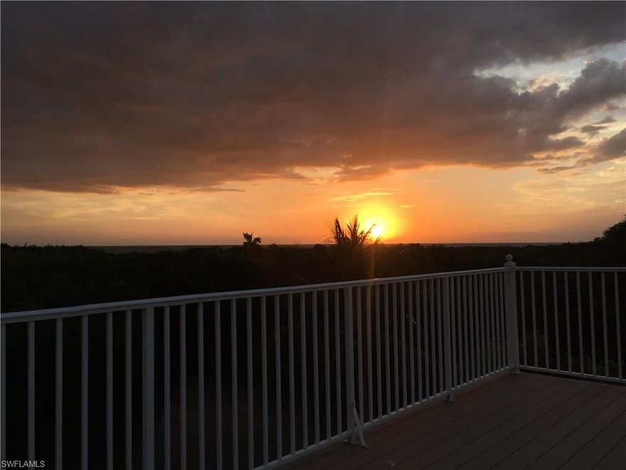 Ever wanted a totally unique house w/boating access to the Gulf from your backyard, fishing off the dock, privacy & just a few yards from the beach? This Floridian style home is it! 4 bedrooms,2.5 baths,an entertainment bar,bonus room (exercise),2 car garage,heated pool and hot tub,open kitchen,high ceilings,plus a massive entertainment deck and boat dock with lift. The roof top "widows walk" offers panoramic views of the Gulf of Mexico and Sunsets every night. This is THE "Must See" Home!