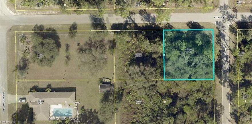 Great corner lot in fast growing area of Lehigh Acres. Buy your lot now as prices are moving up and build on it later. 105 X 105 in area of new homes