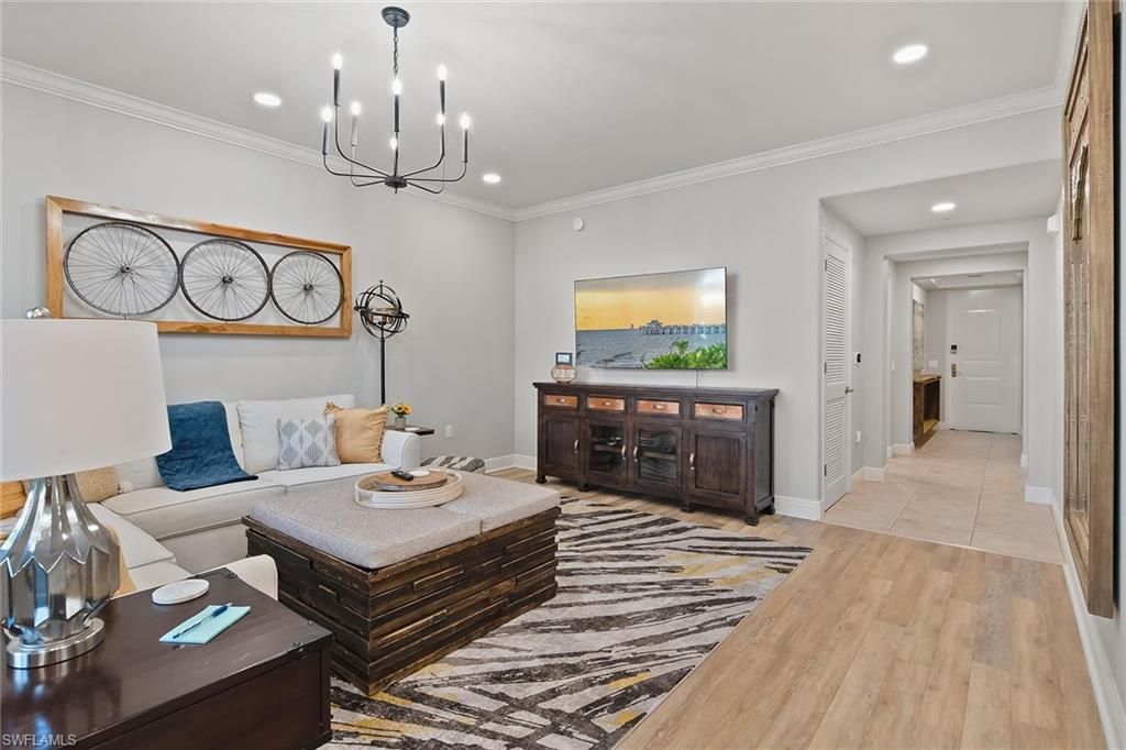 Photo of 1015 Sandpiper ST #D102, NAPLES, FL 34102 (MLS # 225083267)