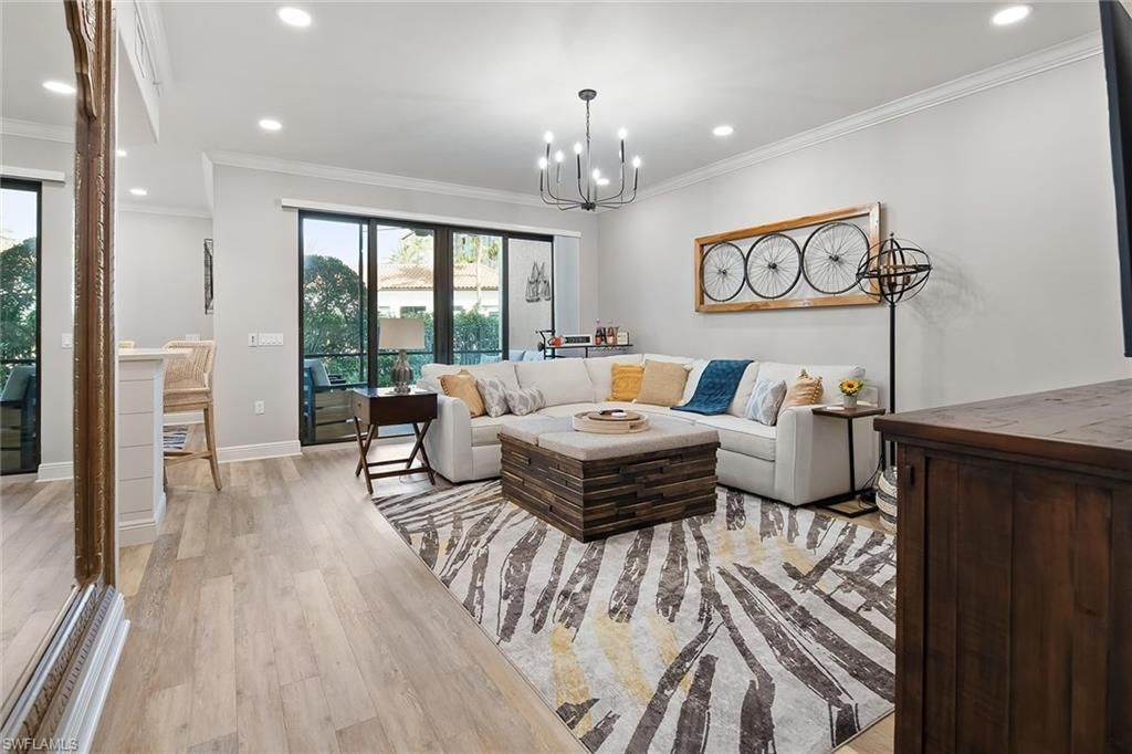 Photo of 1015 Sandpiper ST #D102, NAPLES, FL 34102 (MLS # 225083267)