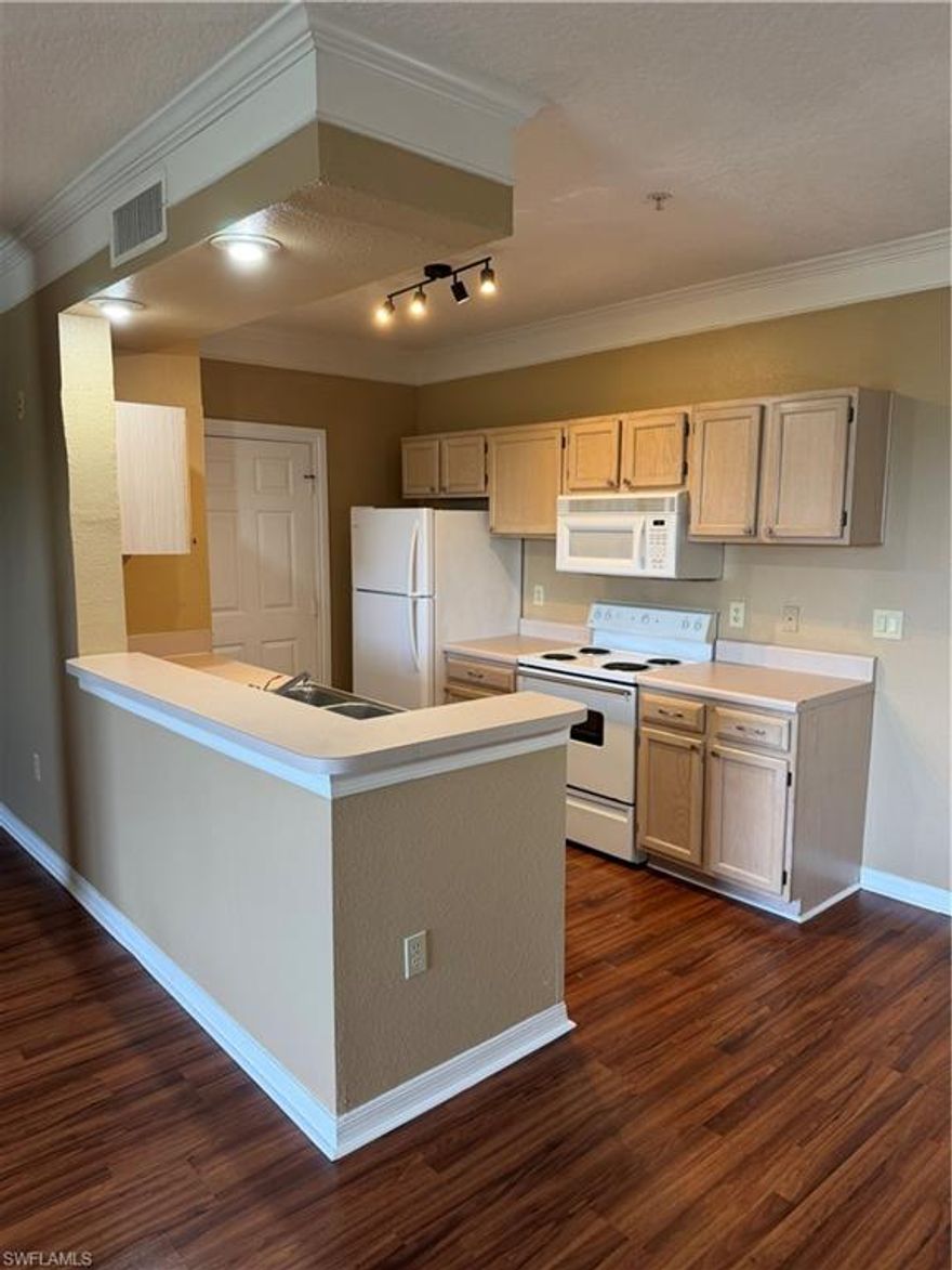 Beautifully maintained second-floor 1-bedroom + den condominium in the desirable Royal Greens community, offering serene water views and an inviting, open layout. This residence features wood flooring throughout, a spacious primary bedroom with walk-in closet, and a versatile den ideal for a home office or guest space. Enjoy the convenience of an in-unit washer and dryer, abundant natural light, and peaceful water views.

Available for annual rental. Tenant responsible for all utilities and cable. Ideally located with easy access to community amenities, shopping, dining, and major roadways I 75—perfect for comfortable year-round living.