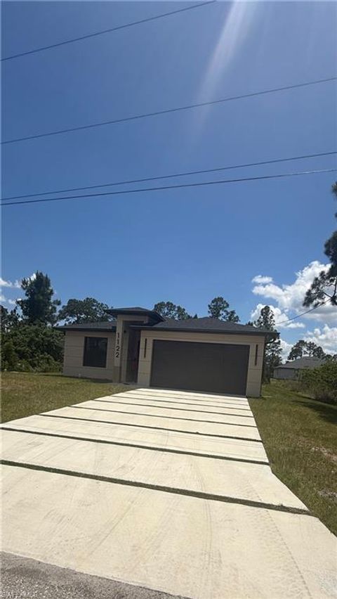 Photo of 1122 Craft ST E, LEHIGH ACRES, FL 33974 (MLS # 226017457)