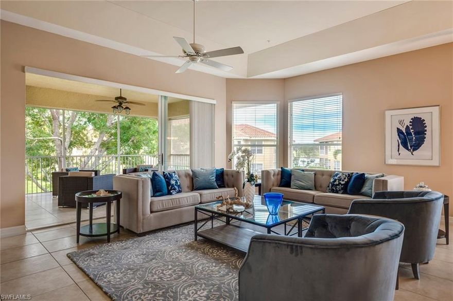 Outstanding opportunity in Pelican Marsh! Luxurious condominium that features an elegant foyer, 2,216 sq/ft of living space, porcelain tile flooring, soaring ceilings with tray detail, large bay windows, split bedrooms for privacy, master bedroom with ensuite bath, and attached 2-car private garage making it feel more like a home than a condo.  With western exposure and a "wedge view" of the golf course, lake and sunsets, spending time on the cozy lanai will soon be your favorite spot to relax.  A great oak sits just outside the lanai offering the feeling like you're perched up in the treetops - blissful with your favorite beverage!   Les Chateaux is centrally located within a tranquil setting of lakes & preserves. In the afternoon, play tennis or Golf, drive to Whole Foods 6 minutes away for groceries or enjoy dinner and a night out at Mercato as the location to both nightlife & beaches is fantastic. Make no mistake, turning into the Pelican Marsh entrance off Rt. 41 returns you to the privacy, security and serenity that is Pelican Marsh. Amenities include fitness center, 9 lighted, fully staffed Har Tru tennis courts, spa services and social events at the community center.