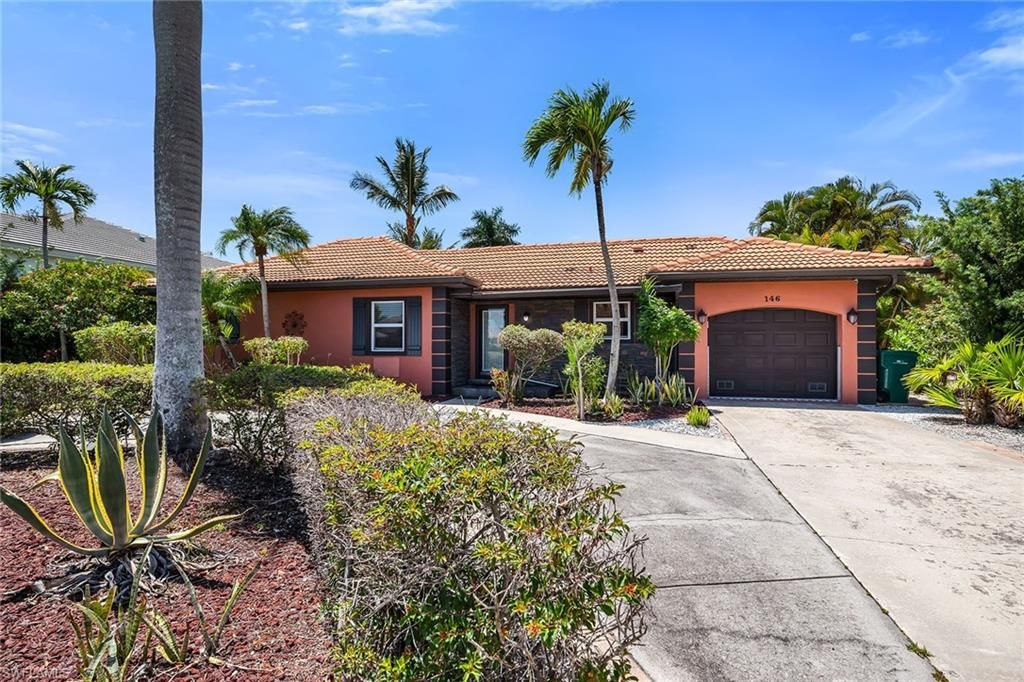 Photo of 146 Greenbrier ST, MARCO ISLAND, FL 34145 (MLS # 226016733)