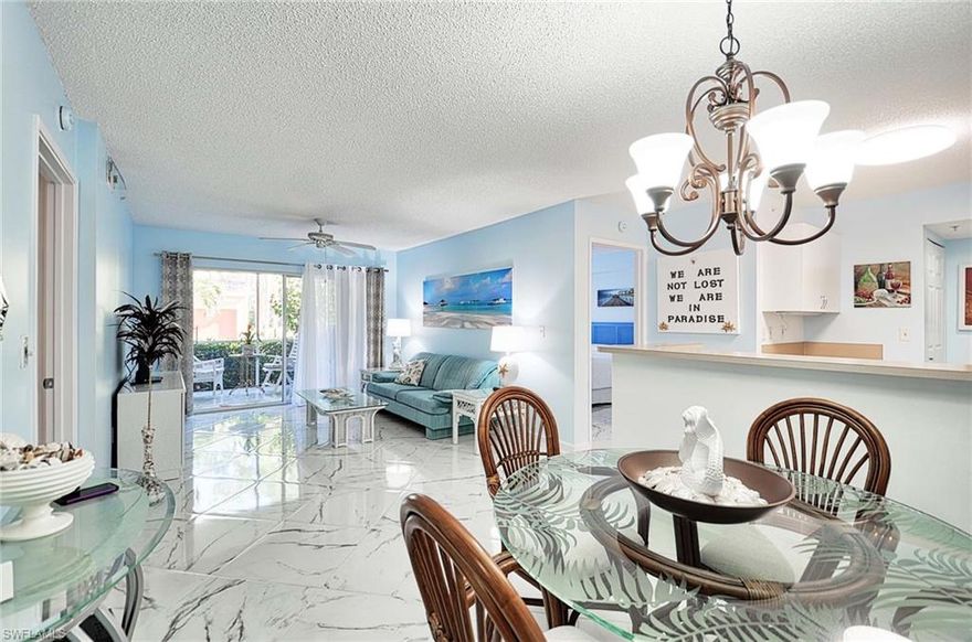 Very well maintained move-in ready unit. Light and bright with beautiful porcelain tiles throughout . Napoli is a gated community located only 5 miles from Downtown and beaches offering great amenities with low HOA.