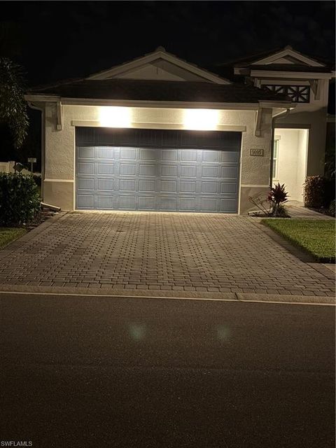 Photo of 9095 Saint Lucia DR, NAPLES, FL 34114 (MLS # 225077883)