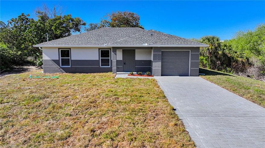 BRAND NEW CONSTRUCTION ON A FRESHWATER CANAL LOT WITH A GREAT WATER VIEW! You Will Be Amazed By The Quality Of This Brand New 3 Bedroom/2 Bathroom Canal Home With Western Exposure For Those Amazing Painted Florida Sunsets On A 1/4 Acre Canal Lot In Lehigh Acres, FL. This Home Has 1258 SF Under Air And It Is COMPLETELY Finished With Its CO Issued! You Can Move Into It Today Or Use It As A Cash Flowing Rental Unit (High Demand). The Gourmet Kitchen Comes With Quartz Countertops, STAINLESS STEEL APPLIANCES, White Real Wood Shaker SOFT TOUCH Cabinet Doors & Drawers, Glass Tile Backsplash, Floor To Ceiling Pantry, And A Large Breakfast Bar. Other Upgrades Include; FREE BRAND NEW WASHER AND DRYER WITH PURCHASE OF THIS PROPERTY, HURRICANE IMPACT WINDOWS AND DOORS, Glass Back Door To Let In More LIGHT, Large Designer Porcelain Tile Flooring Throughout Entire Home, PAVER DRIVEWAY, High Ceilings, Large Living Room, Upgraded Baseboards, Large Dining Area, Custom Interior/Exterior Two-Tone Paint, Custom Ceiling Fans/Lights, Large Walk-In Closets, Quartz Countertops In The Bathrooms Along With Accent Tile Over The Tub Areas, New Landscaping Package With Old Growth Trees, Southwest Exposure For Those Beautiful Florida Sunsets, Epoxy Coating In The Garage And On The Open Covered Lania, And A Laundry Area Including A New Washer And Dryer Inside The Home. This Home Is Close To Regional Shopping Malls, Golf Courses, Interstate I-75, Regional Airport, FGCU, Restaurants, Schools, Golf Courses, MLB Spring Training Baseball, Outdoor Parks, Boat Ramps, Amazing Fishing, And Those Amazing White Sand Beaches Of The Gulf Of America! The Photos And Tour Are From An Identical Home On A Different Lot.