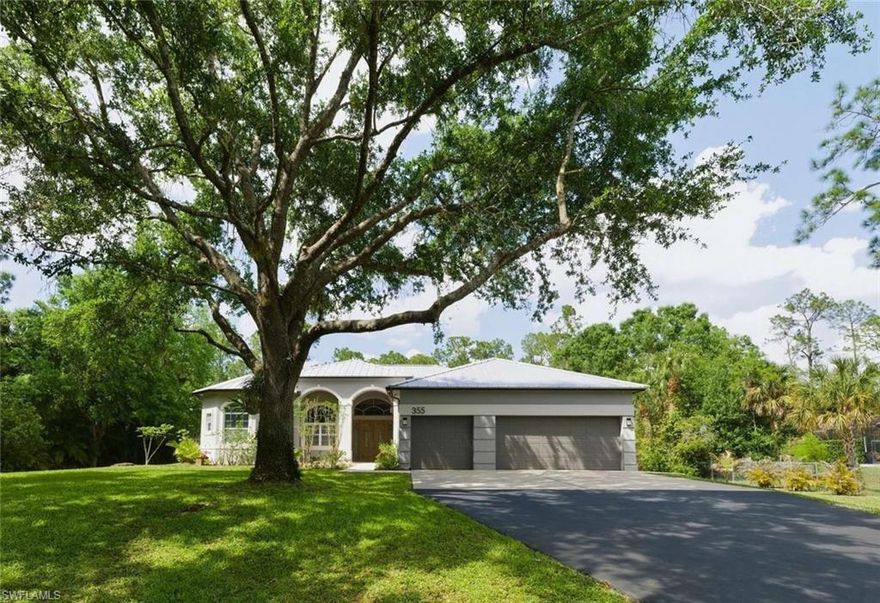 Priced for quick sale! Move-in ready, furnished, immaculate 5B/3B REMODELED POOL HOME on 2.27 Acres in Golden Gate Estates. One level, no HOA, 3-car epoxy garage, whole house RO with UV filter. Food forest with many tropical fruit trees! Tucked near the end of quiet dead-end street, yet close to schools, shops, dining & beach via future Vanderbilt Rd ext.! Inside, you’re greeted by a bright, open, and welcoming feel. Expansive tall ceilings, 8’ doors, and large windows create an airy, spacious atmosphere overlooking a beautiful park-like setting with irrigation. Gourmet kitchen fully remodeled (2017) boasts custom cabinetry, Bosch appliances, induction cooktop, double wall ovens & quartz counters. Bathrooms remodeled (2017) with quartz counters, tile showers & new cabinetry. Oversized primary bath features large soaker tub. Addt’l upgrades include wide plank ceramic tile flooring, crown molding & plantation shutters. Horses: ~1 acre hot-wire enclosure with shelter, shed for tack/hay storage. Add’l upgrades: 2025 metal roof (25 yr warranty) 2023 exterior paint 2022 irrigation, asphalt drive 2022 Washer /Dryer 2021 pool heater, pump, & timer 2020 dual A/C units 2017 pool cage