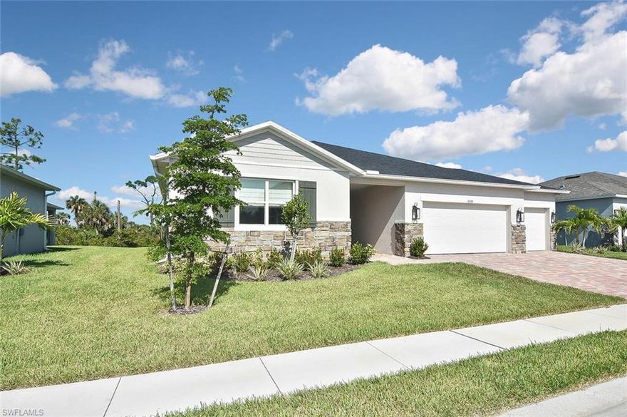 Your search ends here. Tucked inside the gated community of Coves of Estero Bay, this 2023-built home has been meticulously maintained and sits on a quiet lot with nothing but preserve behind it. With four bedrooms, two bathrooms, 2,301 square feet of living space, and a three-car garage, this home checks every box. Sitting high and dry with no flood history and no CDD, this is the kind of purchase that brings peace of mind from day one. The open floor plan connects the kitchen, dining, and living areas in a way that actually works for everyday life. The kitchen features a large island, pantry, KitchenAid stainless steel appliances, and warm wood cabinetry. Tray ceilings add height to the primary suite, which includes dual sinks and a walk-in shower. Out back, the screened lanai overlooks a wide open yard with preserve views and western exposure. The oversized paver driveway and three-car garage provide plenty of storage and parking for the whole family. Situated just off Alico Road in Fort Myers, you are minutes from RSW International Airport, Gulf Coast Town Center, Florida Gulf Coast University, Coconut Point Mall, and some of the best dining and shopping the area has to offer. Top-rated schools, major medical facilities, and quick access to I-75 make this address one that is hard to beat whether you are commuting, traveling, or simply enjoying everything Southwest Florida has to offer.