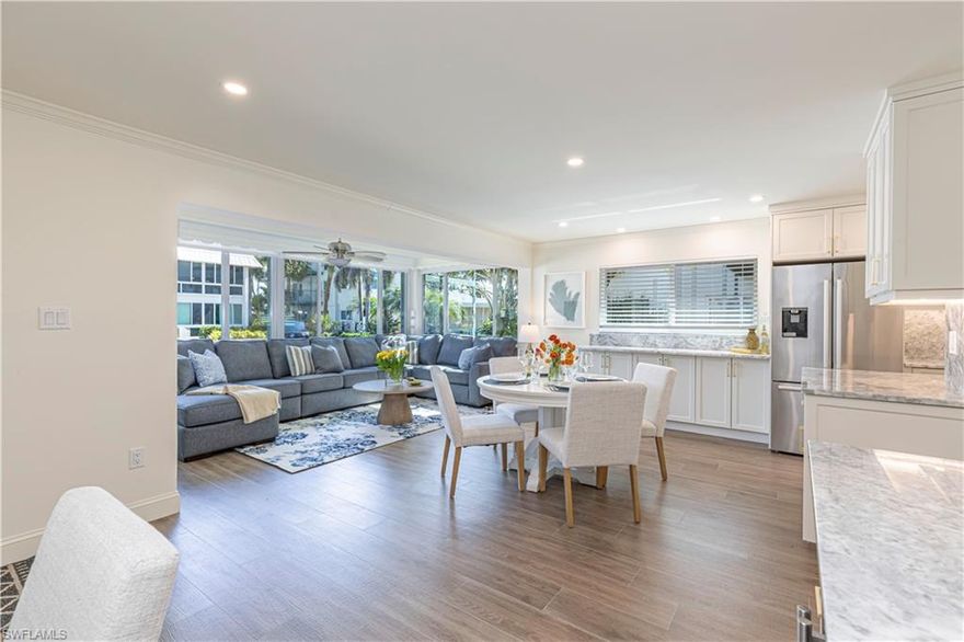 Bright, airy and full of sunshine, your Naples beach retreat awaits. Stroll across the street to private Moorings Beach Club or enjoy the associations private pool located right on Hurricane Harbor while watching the boats and marine life. It’s an ideal intimate location. The best of Naples outdoor life, especially sunsets, is just steps away from your front door.
Welcome to Port au Villa, where the relaxed elegance of Naples beach life is steps away. This impeccably remodeled corner unit captures the essence of coastal living, bathed in natural light and thoughtfully updated throughout. Inside, the chef's kitchen with dual cooling wine fridge sets the stage for evenings spent in, while the beach, soon to be completed Four Seasons resort, and Naples'vibrant dining and shopping scene are all within easy reach.
The intimate community is perfect for full-time living, a vacation getaway, or a smart investment opportunity with it's generous rental policies. Whether you're seeking relaxation or adventure, Port au Villa offers an unmatched lifestyle in one of Naples most coveted locations.