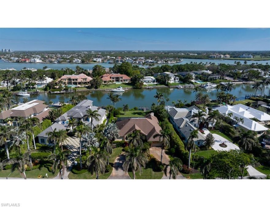 Nestled along Spyglass Lane in the prestigious Port Royal community, this remarkable property presents a rare opportunity to design and build a custom estate that takes full advantage of its tranquil surroundings. With impressive depth and a generous building envelope, the lot invites endless possibilities. Enjoy beautiful color-filled sunrises from this serene setting overlooking Runaway Bay. Boating enthusiasts will enjoy direct, no-bridge, access to Gordon Pass and the Gulf of Mexico, along with convenient routes to the inland waterways leading to the pristine estuaries of the Ten Thousand Islands. The property is being offered in “As-Is” condition. Port Royal Club membership eligibility.