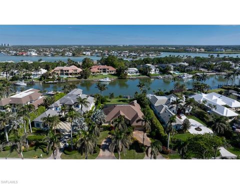 Photo of 1013 Spyglass LN, NAPLES, FL 34102 (MLS # 225008146)