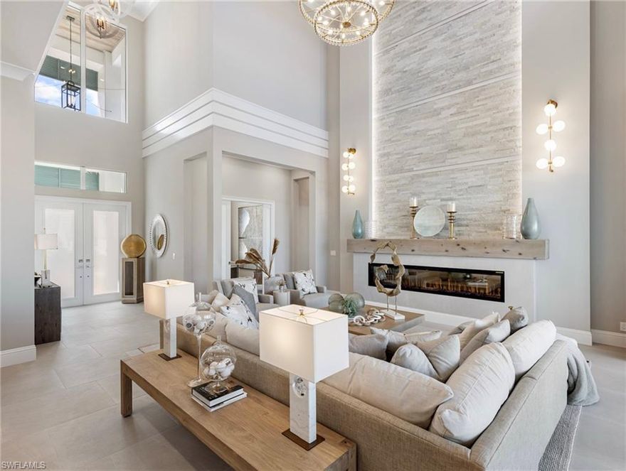 WATCH THE VIDEO! WATCH THE VIDEO! Brand new, turn key, gulf access, Palm Acres! The finest new construction gulf access luxury home in the Fort Myers market is NOW available! Must see photos, but WATCH THE VIDEO! The first word out of your mouth will be WOW!!! Designer furnished turn-key BRAND NEW luxury waterfront model home in the gulf-access deed restricted community of Palm Acres near Sanibel Island. Custom designed to incorporate the most highly sought-after cutting-edge housing details for 2025! Coastal contemporary, great room concept, flex dining, two-story, 3679 sq ft of living area, home office, 4 bedrooms, 4 full baths, wet room in master bath, pool bath, elevator shaft utilized as two large closets, 3-car garage with epoxy floor, large bonus billiard room, and balcony. The kitchen exceeds expectations with Sub-Zero refrigerator, WOLF induction cooktop, WOLF wall oven, WOLF microwave, hidden walk-in pantry, and a 12ft x 4.5ft island with waterfall quartz countertop. Everything you desire is found within this master suite including 10ft tall impact rated sliding glass doors, access to the pool area, views of 120ft wide canal, his and her walk-in closets, and a 5-STAR master bath. Outdoor living areas in SW Florida are now a serious extension of the waterfront lifestyle! Here you will find a fenced backyard along 80ft of deep water canal frontage with 2,070sf of travertine marble, 32ft salt pool, 7inch deep 18ft x 6.5ft walk-in beach, heated spa, pool shower, two outdoor lanai areas, and fully appointed outdoor kitchen including ZEPHR range hood, Alfresco grill, refrigerator, ice maker, sink, and finished ceilings, all under the watchful eyes of Calamari the 3ft x 3ft teak octopus. Ceiling heights are 25ft in the great room, 12ft ground level, 10ft upper level, and 12.5ft in the garage for your car lifts. Finishings include transom windows for natural light galore, tongue & groove, coffered ceilings, wood flooring, 100in horizontal fireplace, 12ft mantel, stunning light fixtures in every room, 8ft interior doors, and impact rated windows. Edge Water Development Group delivers the highest quality attention-to-detail luxury homes available anywhere due to their inhouse fulfilment of stucco, exterior trim, interior framing, and interior wall finishes. New seawall! Call now, because the NEWEST and BEST won't be available for long.