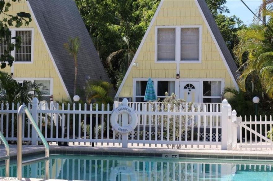 OVERVIEW: Rare investment opportunity to own a hotel with nightly rentals on Sanibel Island. Perfectly positioned investment location along the islands bike path and walking distance to beaches, shopping, dining establishments FEATURES: 12 nightly units and 1 managers cottage or possible monthly rental, each with private bathroom and kitchen. Efficiencies, studios, and three spacious A-frame cottages. 2.44-acres boasts spacious grounds, including a large pool, picnic areas, bike storage, ample parking, tranquil pond, office area, laundry facility and storage. VERSATILITY: Whether you envision a boutique hotel recreated within the existing footprint or redesigning for residential development, it offers the flexibility to explore both options. SANIBEL RARITY One of the few properties on Sanibel Island permitted for nightly rentals. VISIBILTY: located along the island's main road while benefiting from its set-back position, allows amble privacy. HIGHLIGHTS: Ideal visibility and located just under a mile from the beautiful white sandy beaches, this is an exceptional opportunity to create a unique hospitality experience. Don’t miss this chance to own a piece of Sanibel and transform this iconic 1959 motel into a sought-after boutique hotel.