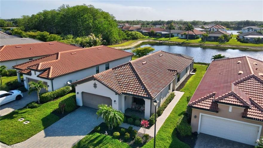 Welcome to your private waterfront retreat, where serene views of both water and preserve create the perfect backdrop for relaxed Florida living. Perfectly nestled in the gated community of Arborwood Preserve, this beautifully maintained 2-bed plus den home offers a versatile layout ideal for both everyday comfort and entertaining. The extended screened lanai is a true showstopper an ideal place to enjoy morning coffee as the sun rises and peaceful evenings all while overlooking tranquil water and lush preserve views, through the panoramic extended screened paver lanai. Step inside to discover a spacious, light-filled interior highlighted by a large kitchen featuring stainless steel appliances, a huge center island perfect for gathering, and a generous walk-in pantry for ample storage. The open-concept design flows seamlessly into the living and dining areas, all positioned to take advantage of the peaceful natural surroundings. Additional features include a charming front porch, perfect for welcoming guests or relaxing outdoors, along with major updates that provide peace of mind: a new AC system, new water heater, and a premium Kinetico water treatment system. This home combines comfort, style, and nature in one exceptional package! Your slice of paradise awaits.