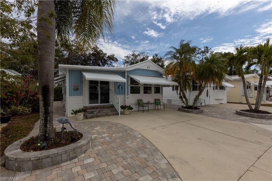 This home is back on the market after the buyer got cold feet. This is one of the nicest homes that you could find at this price point.  The pictures don't begin to do it justice.  There are beautiful pavers that surround the home.  The front and back porches are even made with pavers for an elegant look.  As you enter the home, you immediately see that the home has been tastefully decorated with beautiful wood look floors.  The kitchen, hallway, and dining areas feature 18" ceramic tile placed on the diagonal, giving the whole area a larger appearance. Bring your coffee cup into the cheerful dining area and make yourself at home. Another bonus is the separate laundry room with lots of storage added.  The 2nd bath also has a nice sized closet for additional storage.  This one is a gem!