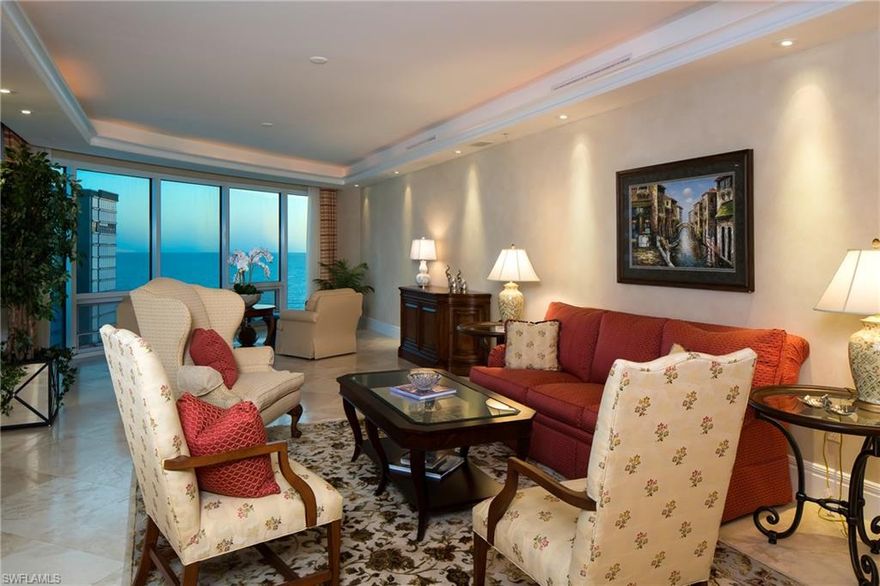 C.14190 - The splendor of coastal living with magnificent Gulf and Venetian Bay vistas encompass this refined and spacious Aria Residence. Luxurious offerings include marble floors, volume ceilings, whole house sound, a soft neutral palette & multiple terraces encouraging indoor/outdoor living. The great room enjoys gulf views & breezes thru window walls & screened terrace.  Stunning crystal lighting illuminates the main gallery to the formal dining room topped with an elegant crystal chandelier. The chef’s kitchen is appointed with bar area, island, custom cabinetry, granite, gas cook-top, nook & breakfast bar. A fireplace highlights the open family room flowing to a wraparound terrace with colorful bay vistas.  A sumptuous master suite enjoys a private Gulf terrace and luxurious marble bath. A study with custom built-in library & desk plus two more spacious guest suites with terrace capture glistening bay views. Aria amenities include a beachfront pool, direct beach & Gulf access, a state of the art fitness room, spa, sauna, massage, billiards room, 24/7 security & pet friendly. Residence 1201 includes a 2 car under building garage & extra storage.