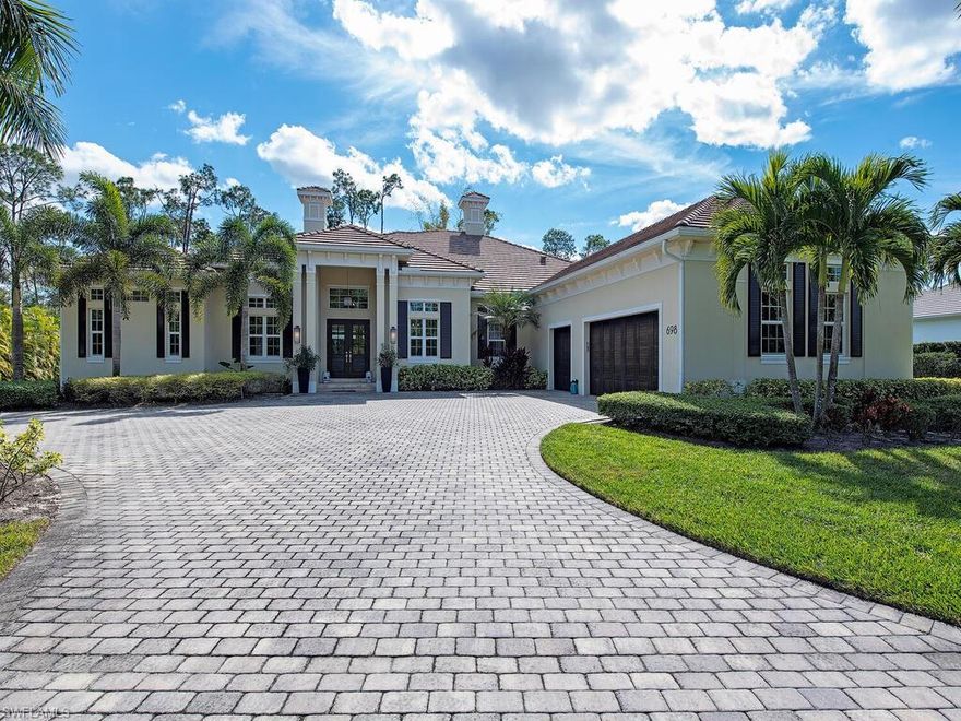 H4711 - Welcome to this wonderful custom-built home with open floor plan and sun-filled spaces throughout. You will find many upgraded features here including marble, white oak plank wood and tile flooring, soaring ceilings, vapor fireplace in the living room, an upscale kitchen with large island, quartz counter tops, convection wall oven, propane gas 6 burner range. The home is protected with impact-resistant windows and doors as well as roll down storm screens on lanai.  All rooms are generous in size and each bedroom has its own bath. The inviting outdoor oasis with propane gas-heated pool and spa, sun-filled deck, outdoor kitchen with built-in gas grill, gas fire pit and comfortable under-roof lanai space with a propane gas fireplace combine to provide the much sought-after luxurious Florida lifestyle. This property is enclosed with a fence and an electronic gate for added privacy. Minutes to beaches, shopping, and restaurants.