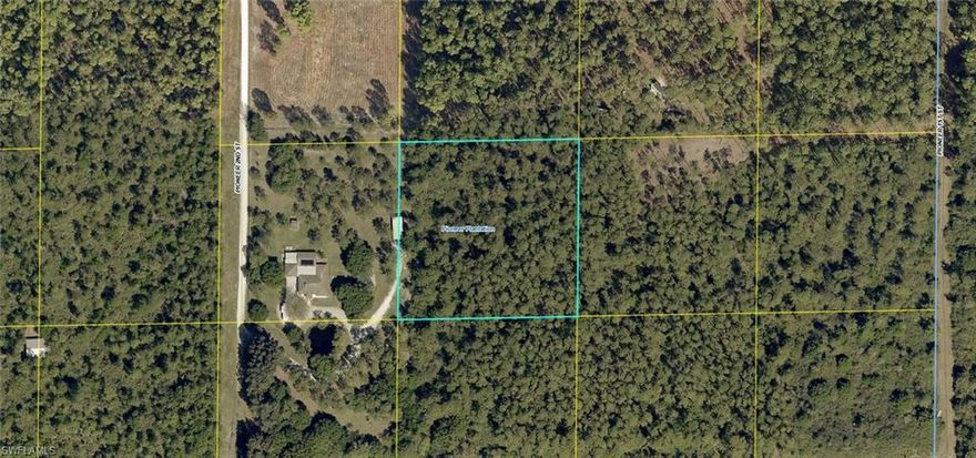 2.5 acres ready for new construction or the investor. The property is due east of 5455 Pioneer 2nd St.
