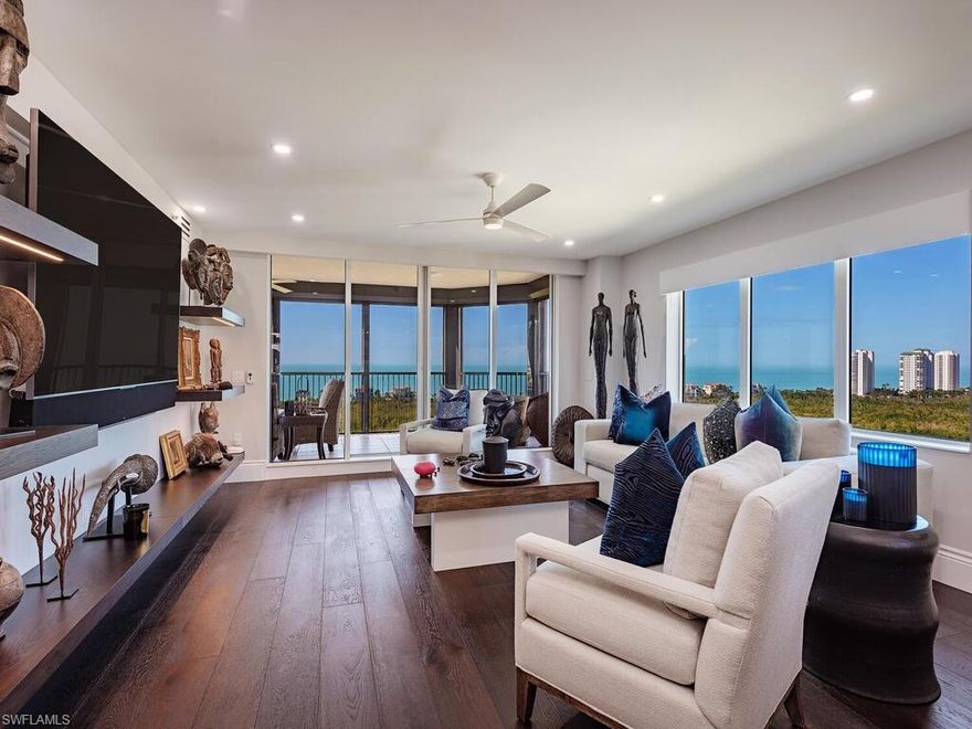 This truly one-of-a-kind, 17th-floor masterpiece, has been completely renovated to provide the lifestyle everyone dreams about. The 2,555-square-foot, two-bedroom, 2-1/2 bath plus den residence is furnished for beauty and
comfort. The soft clean interior finishes will enrapture one in elegance while feasting upon the magnificent vistas of the Gulf of Mexico and Pelican Bay. Experience every sunrise and sunset while enjoying the sounds of songbirds and gentle breezes from two large lanais. Soak in the warmth of the Gulf, sun, and natural beauty of Southwest Florida while walking the berm or riding the tram through the mangroves and scenic waterways to the white sand beach and private clubhouse with outdoor dining. Situated within The Marbella, a luxury high-rise with wonderful neighbors and genuinely helpful staff, the amenities are second to none, with concierge, dining including room service and care services at your fingertips.