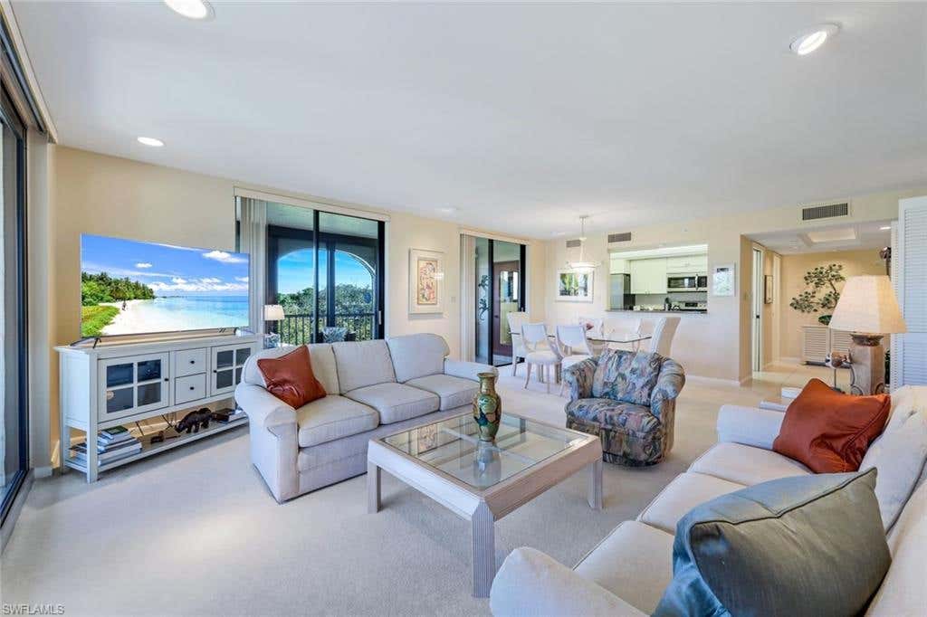 Photo of 6040 Pelican Bay BLVD #D-404, NAPLES, FL 34108 (MLS # 224018097)