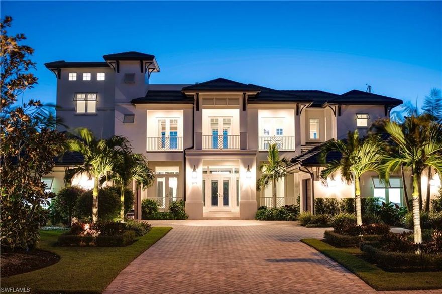 This Home was completed Feb. 2017. Located on a quiet cul-de-sac in estates of Royal Harbor and a truly exceptional custom built home. Award-winning Builder & Architects, this sophisticated home offers over 5,518 sq. ft. and an expansive 199’ of Deep Water Canal (Sailboat Depth) with Direct Access to the Gulf of Mexico and Naples Bay, 3 Car Garage with car lift height garage ceilings. This home perfectly accommodates deep water boats. It’s equipped with elevator from garage to each of 4 floors and all with fine finishes, fixtures and amenities throughout this light-filled home. Great first floor Guest Suite with pool entry, Gourmet Kitchen with a large walk-in pantry, wine cooler and custom cabinetry. A second floor bonus room with 2 balconies, Private Entry large master suite with attached private office. The third-floor observation and entertaining deck will stun your guests with sunset views, and is easily accessible by stairs or elevator. Fully equipped with a gas fireplace, Sub-Zero, Bosch, and Wolf appliances, as well as state-of-the-art Smart Home technology. Do not buy anything in Royal Harbor until you see the value of this elegant home.