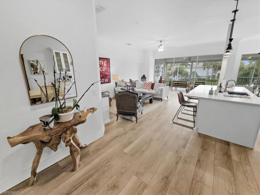 Completely remodeled seasonal rental in Calusa Bay. This beautifully furnished second-floor unit offers southwest exposure with stunning lake views and abundant natural light. The redesigned kitchen features new appliances, custom cabinetry, and sleek countertops. The primary suite includes a king bed and serene water views, while the second and third bedrooms offer queen beds and TVs in every room. Enjoy resort-style amenities including clubhouse, fitness center, pools, tennis courts, and scenic walking trails. Prime Naples location near Mercato, Galleria at Vanderbilt, Waterside Shops, dining, and world-famous beaches.