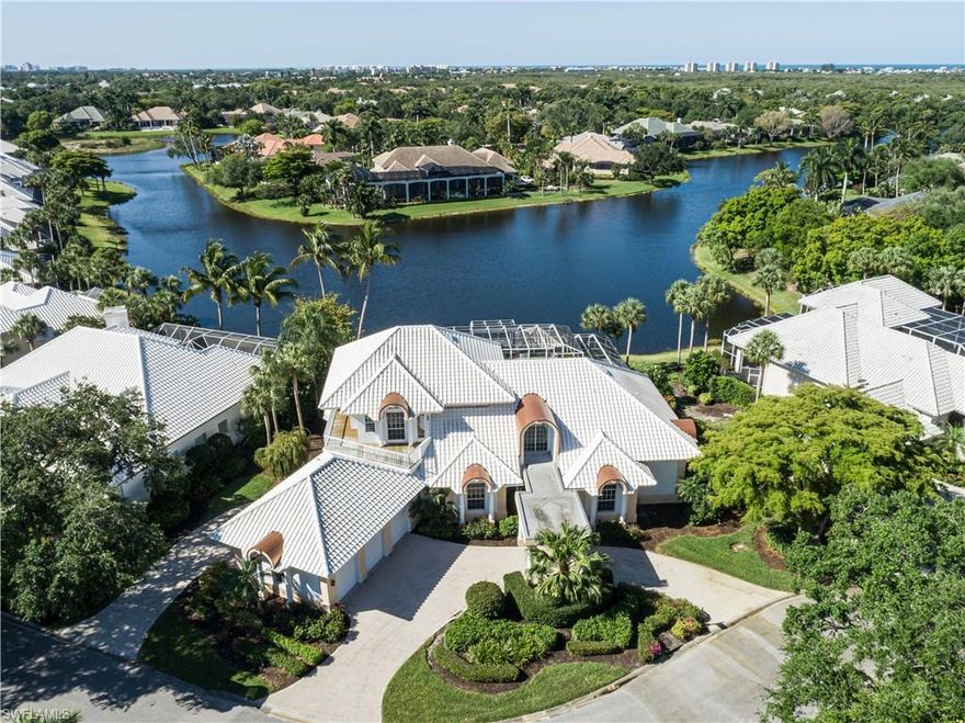 REDUCED TODAY NEARLY $500K.  HURRY. PRICED REDUCED FOR QUICK SALE !!  ONE OF THE TOP LAKE VIEWS IN BONITA BAY ! !  RARE OPPORTUNITY TO MAKE THIS ONE YOUR DREAM HOME.  2 STORY LOCATED ON OVERSIZED LOT WITH CIRCULAR PAVER DRIVEWAY AND 3 CAR GARAGE WITH FRONT AND REAR DOORS.  VERY BRIGHT AND OPEN FLOOR PLAN WITH TONS OF LIGHT AND VERY HIGH CEILINGS.  HUGE FAMILY ROOM WITH FIREPLACE, GAME ROOM, DEN, MASTER SUITE WITH SITTING AREA, 2ND FLOOR WITH 2 EN SUITES AND 2 SUNDECKS.  LARGE SCREENED LANAI WITH POOL AND SPA, SUMMER KITCHEN AND POOL BATH.  ROOF 2018.  MOST AMENITIES AVAILABLE WITH COUNTRY CLUB AND BEACH CLUB MEMBERSHIP.  CALL CLUB FOR MORE DETAILS.