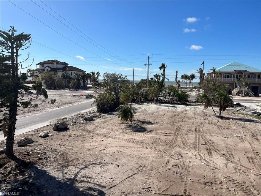 Located so close to the beach access, (just across the road) you don't even need your flip flops to walk there!  Hurricane Ian caused severe destruction to the home that was here, and it needed to be cleared from the property.  However, it is a fabulous location for new construction of your dream home!  Fort Myers Beach is in the process of recovering from Hurricane Ian.  However, at 169 Lanark Avenue, you’re only about 3 miles north of the new Margaritaville Resort that is scheduled to open fall 2023, as well as the return of Times Square at the public Fort Myers Beach - where the majority of shopping & restaurants are at!  Yet, you’ll be just far enough away from the Margaritaville Resort and Times Square for a quiet, relaxing area to live and enjoy!  Take advantage of purchasing this property for the gorgeous beach days and breathtaking sunsets – every day!  A property of this perfect size for construction and great location won't last long!