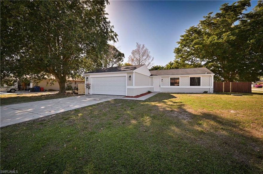 Fantastic remodeled 3 BR 2 Bath Home on oversized corner lot with privacy fencing! HUGE back yard with plenty of room for a pool! Completely remodeled kitchen with brand new stainless steel appliances, new cabinets & countertops! Wood-look tile throughout living area and Primary suite with new carpet in guest bedrooms! Freshly painted exterior and interior! New garage door! No HOA or HOA Fees! Awesome, convenient location close to beaches, shopping, restaurants, airport, FGCU, I-75 and 41! Super close to parks, community tennis courts, & a public library! So much to offer at an affordable price!