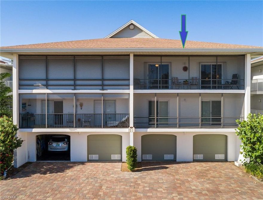 The panoramic view of the Sanibel River welcomes you from the moment you walk in the front door of this beautifully renovated unit at Sunset South.  Enjoy the wildlife activity from the glass walled living room or spend time gazing at the gulf from the screened in lanai.  The redesigned kitchen includes solid cherry cabinets and stainless appliances, a full size stackable washer and dryer is in the pantry. The nicely flowing floor plan includes tasteful furnishings, two bedrooms and two full baths. Both bedrooms include sliders that open to a screened lanai with gulf views. There is easy access to the private one car garage and large storage room. The unit has both electric and manual shutters to provide added storm protection at all openings. Sunset South is a low-density complex consisting of 56 units in 14 buildings including a heated pool, private clubhouse, and beach front access. Unit 7C is completely move-in ready and being sold turn-key, you will not be disappointed. Sunset South is located along the beautiful mid island stretch of beach and within walking distance to several delicious restaurants and a local market.