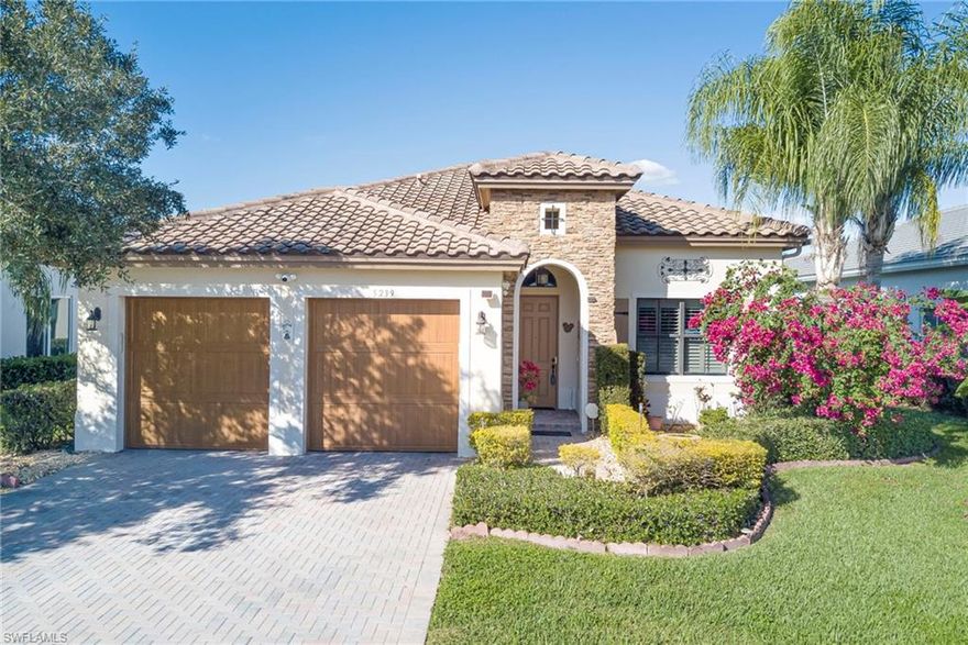 Welcome to 5239 Ferrari Ave, an inviting Almanor floor plan home in Ave Maria offering 3 bedrooms, 2.5 bathrooms, and a 2-car garage, with 1,929 sqft of thoughtfully designed single-story living space. Soaring 12-foot ceilings and many large windows create a bright, open feel throughout the home. As you enter, your eye is immediately drawn straight through the living space to the tranquil lake view in the back, a beautiful focal point that enhances the sense of openness and connection to the outdoors.

The heart of the home is a very spacious kitchen featuring upgraded cabinetry with crown detail and glass-front accents, a tasteful backsplash, pendant lighting above the peninsula, and granite countertops with upgraded thickness. Additional recessed lighting adds both warmth and functionality, while plantation shutters in the living areas and kitchen provide a cohesive and finished look.

The primary suite offers a comfortable retreat with a gigantic walk-in closet and generous proportions that match the home’s spacious feel. Practical updates include a newer A/C system (2020), a smart thermostat controllable from your phone, and a garage door system that automatically closes after 15 minutes if left open, adding convenience and peace of mind.

Located approximately 0.6 miles from Ave Maria’s town center, this home provides easy access to shopping, dining, events, and Ave Maria University. Ave Maria is nationally recognized as a Blue Zone® and ranked among the top master-planned communities in the United States, offering a well-connected and thoughtfully designed place to call home.

Ave Maria: where community meets paradise.