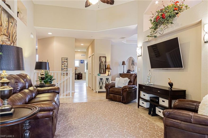 Enjoy the beauty of Lely Resort in this Pristine and beautifully appointed, turnkey furnished  3 bedroom, 2 bath 2nd floor Coach Home in the desirable and gated community of Alden Woods.  The home offers a large granite kitchen with stainless steel appliances,  spacious bedrooms and baths,  1 car garage,  fabric hurricane screens on the lanai, and a peaceful view of the palms.  Enjoy the resort amenities of The Players Club which includes a resort style pool, restaurants, full spa, tennis, pickleball and an array of social activities.  Don't miss this piece of paradise.