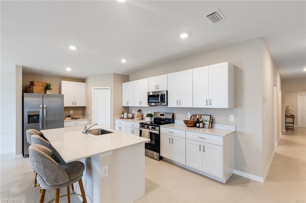 Photo of 11630 Savanna Lakes BLVD, LEHIGH ACRES, FL 33936 (MLS # 226020892)