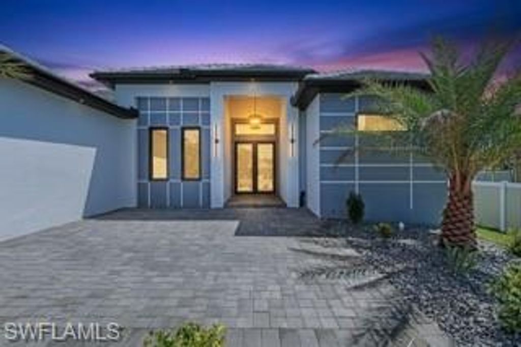 Photo of 2833 SW 25th AVE, CAPE CORAL, FL 33914 (MLS # 226013411)