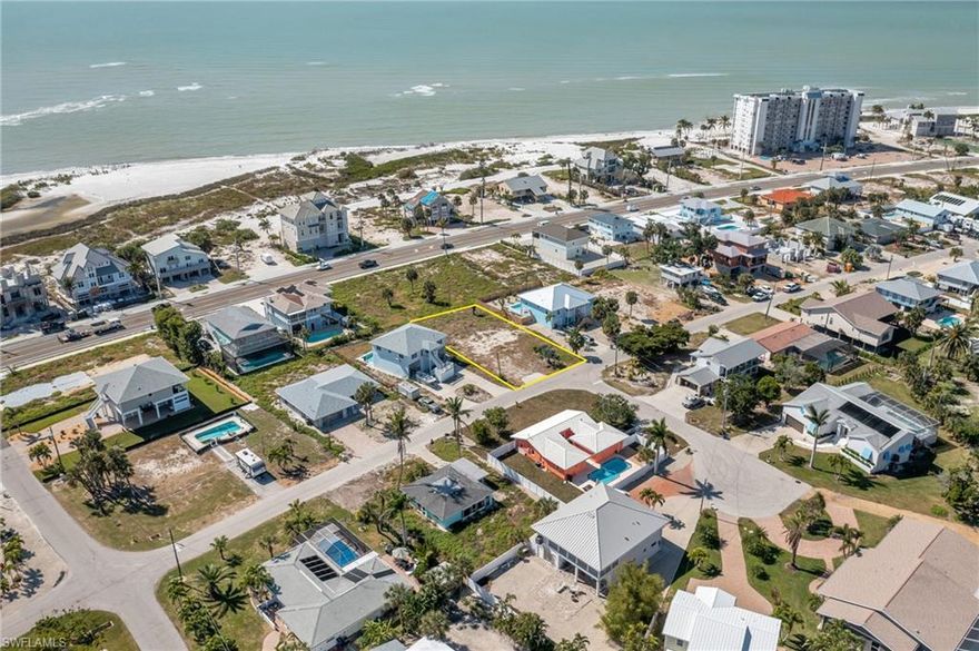 Discover an exceptional opportunity to own a generously sized 74' x 127' cleared lot in the highly coveted Laguna Shores community on the tranquil south end of Fort Myers Beach. Comparably larger than many surrounding parcels, this expansive homesite offers a rare and versatile canvas for creating your custom coastal retreat in one of the island’s most desirable neighborhoods.

Just a short stroll away, residents enjoy two deeded beach access points, providing effortless entry to wide, sugar-white sands where you can soak up the Florida sun, hunt for seashells, spot coastal wildlife, or cast a line directly into the Gulf. This quiet stretch of shoreline remains one of the area’s true hidden gems—peaceful, uncrowded, and quintessentially tropical.

Laguna Shores is surrounded by exciting revitalization and new energy. The south end of the island is flourishing with new developments, including the popular Farmers Markets at Santini Plaza, charming coffee shops, boutique stores, and the highly anticipated upscale steakhouse opening in the thoughtfully reimagined former movie theater. This vibrant transformation is elevating the appeal and value of the entire area.

Enjoy quick access to the luxury conveniences of Naples and the charming, revitalized Downtown Bonita Springs district—both offering fine dining, cultural attractions, and sophisticated shopping. RSW International Airport is also an easy drive, ensuring seamless travel.

Whether envisioning a seasonal getaway, contemporary coastal home, or long-term island sanctuary, this rare and notably large vacant lot presents the perfect opportunity to build your own piece of paradise in one of Fort Myers Beach’s most serene and sought-after communities.