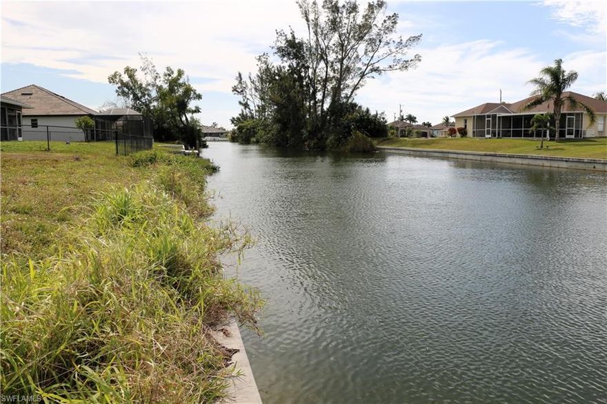 Seawall in place and ready for your dream home! Perfectly situated lot with access to Lake Kennedy and the Chain of Lakes canal system in Cape Coral. Enjoy miles of Kayaking, Boating and Freshwater Fishing. Enjoy beautiful sunset views with the property's western rear exposure.