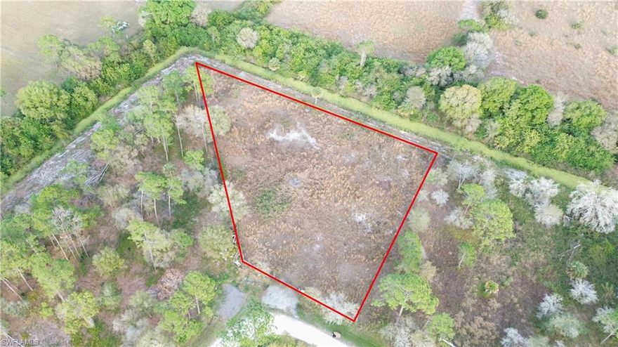 This 1.18 acres is located at the NE entrance of Montura Ranch Estates, Woodlands Subdivision. Property is a corner lot with an irregular shape, fenced in and cleared. There is no neighbor to the back. Property will need septic and well but is ready for your manufactured home or site-built home. NO HOA's, this rural community is golf-cart and horse friendly and pay no city taxes. Less than 20 min to Clewiston, 1.5 hr from each coast. Call your offers in today.