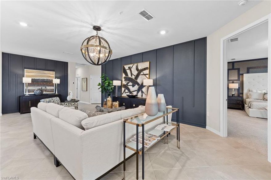 Former Furnished & Designer Model | Baycreek Floor Plan | 3BR + 2BA | 3-Car Tandem Garage
16556 Kingwood Lane #34-202, Punta Gorda, FL 33982

Welcome to this former furnished and professionally designed Baycreek upstairs floor plan, offering 2,110 square feet of modern living with 3 bedrooms, 2 bathrooms, and a 3-car tandem garage. This beautifully appointed coach home is thoughtfully upgraded throughout, blending comfort, elegance, and smart-home convenience.

The entry level features a spacious garage, keyless entry pad, and a hurricane-rated front door for added security and peace of mind. Upstairs, the open-concept living area is filled with natural light and showcases porcelain tile flooring, LED recessed lighting, custom trim millwork, and designer lighting throughout. Sliding glass doors lead to a screened-in lanai overlooking the lake, where you can unwind and take in breathtaking western sunsets—the perfect backdrop for evening relaxation or entertaining.

The chef-inspired kitchen is a true centerpiece, featuring a deluxe stainless steel appliance package, gas cooktop, built-in microwave, and French-door refrigerator, complemented by quartz countertops and a striking oversized center island.

All three bedrooms are located on the upper level, including the luxurious owner’s suite with a spa-like bath offering a designer walk-in shower, quartz vanities, and EPA WaterSense® fixtures. Additional highlights include hurricane-impact windows, Ring Video Doorbell Pro, smart thermostats, and energy-efficient features throughout.

Residents of the Willowgreen community enjoy resort-style amenities including a community pool, cabana with bathrooms, fire pit, and BBQ grilling area—ideal for social gatherings and laid-back Florida living.

With its former model status, premium finishes, lake views, and sought-after Baycreek layout, this exceptional coach home presents a rare opportunity. Schedule your private showing today before it’s gone.

Prices, dimensions, and features may vary and are subject to change. Photos are for illustrative purposes only.