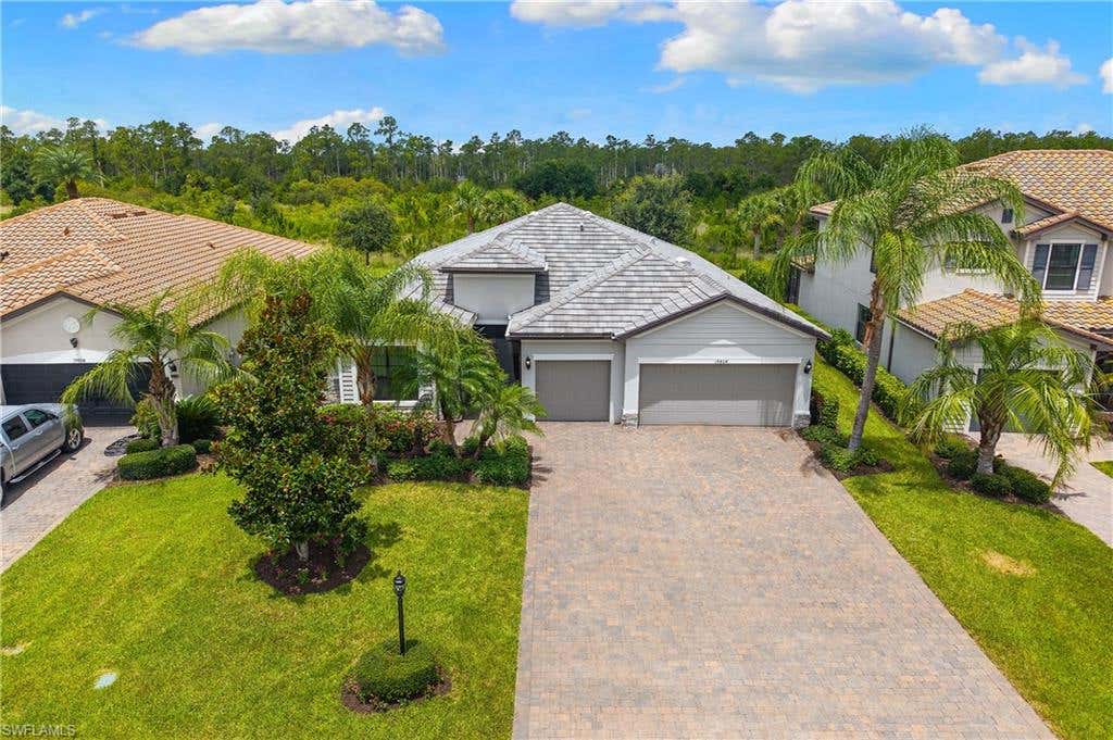 Photo of 19804 Beverly Park RD, ESTERO, FL 33928 (MLS # 226026320)