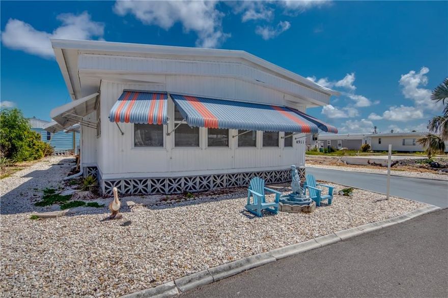 This home was damaged by Ian but has been renovated with new kitchen cabinets, new appliances, new floor, insulation, dry wall thru out the home, master bath has new tile shower, 2 new mini split air condition.  Needs carport. This home is located in the great 55+ community of Pine Island Cove that has a heated community pool, spa, picnic area, dog park, boat & RV storage, boat ramp that has Gulf access. Lot of activities for everyone like bocce, pickleball. Take your boat out for great fishing. This home is nice and move in ready at a great price. You own your land and HOA is only $150.00.