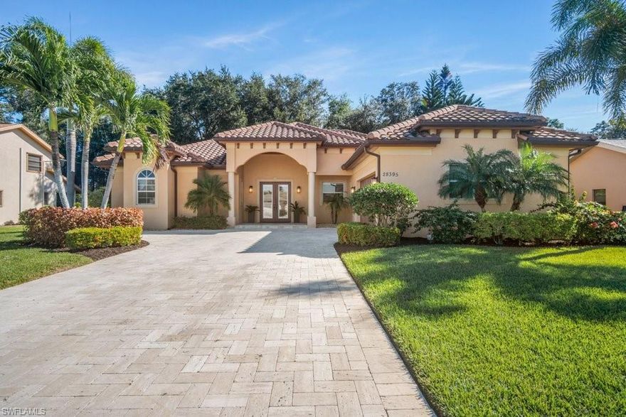 RARE FIND: Spanish Wells custom-built home (built late 2013) w/ upscale premium finishes & improvements! Welcome guests from your Travertine Tile driveway into your soaring 14-foot coffered ceiling'ed Great Room w/ multi-color cove lighting PLUS the submersive surround sound of the custom Klipsch Audio Speaker System for that perfect ambience. Open the impact-glass slider wall to bring the grand 750+ sq. ft. outside screened lanai w/ LED lighted water feature & wooded view inside your 'great' Great Room. Impact-resistant windows throughtout w/ custom Hunter Douglas window treatments. French-patterned Travertine floors & crown molding in the spacious Kitchen w/ Bosch Appliances & cabinetry fitted w/ 'slide-out' drawers to greatly increase storage areas. Premium Granite Counters & 'soft-close' Cherry Wood Cabinets enhance the Kitchen, Laundry & Bathrooms. Oversized screened Lanai has Travertine Tile, built-in 'infra-red' Grill w/ rotissere, water feature, covered & open seating areas & large rock-paved, fenced & screened dog run. Garage w/ flecked floor epoxy finish & custom cabinets. Optional Country Club Memberships available with 27-hole Golf, Tennis, Restaurant, Fitness + more.